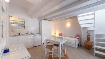 Suite | Private kitchen | Fridge, coffee/tea maker, electric kettle, highchair