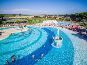 Seasonal outdoor pool, open 9:30 AM to 7 PM, pool umbrellas