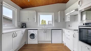 Lodge, 2 Bedrooms | Private kitchen | Fridge, microwave, stovetop, coffee/tea maker
