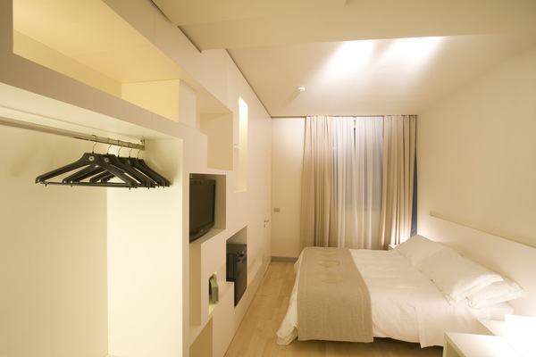 Kamar Double Superior | Seprai premium, selimut bulu angsa, minibar, dan brankas