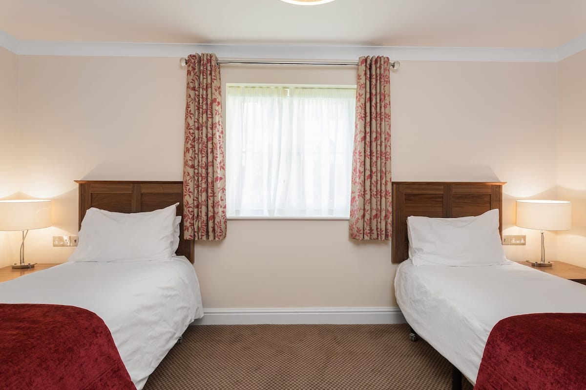 In-room safe, iron/ironing board, cribs (free), WiFi (free)