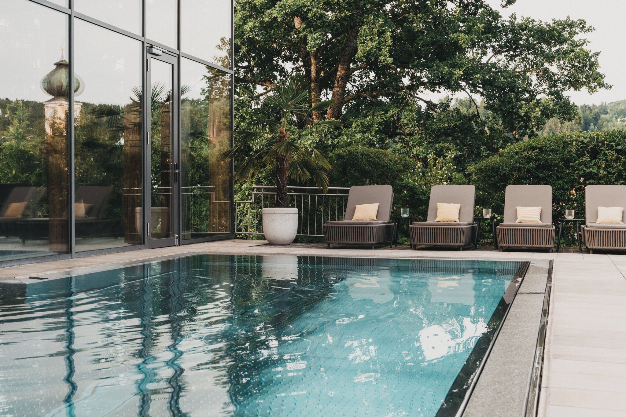 Indoor pool, outdoor pool, pool umbrellas, sun loungers
