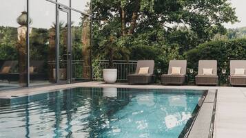 Indoor pool, outdoor pool, pool umbrellas, sun loungers