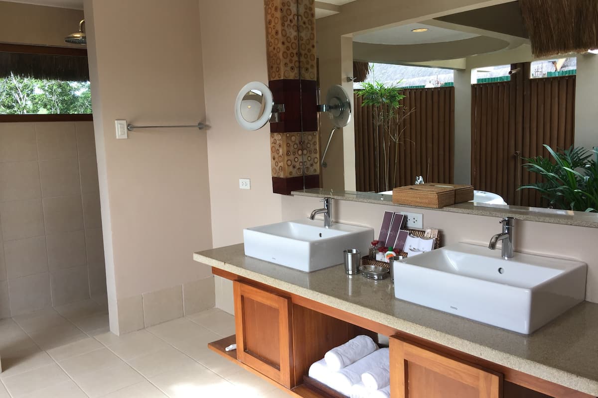 presidential villa with infinity pool | bathroom | separate bathtub and shower, jetted bath, designer toiletries