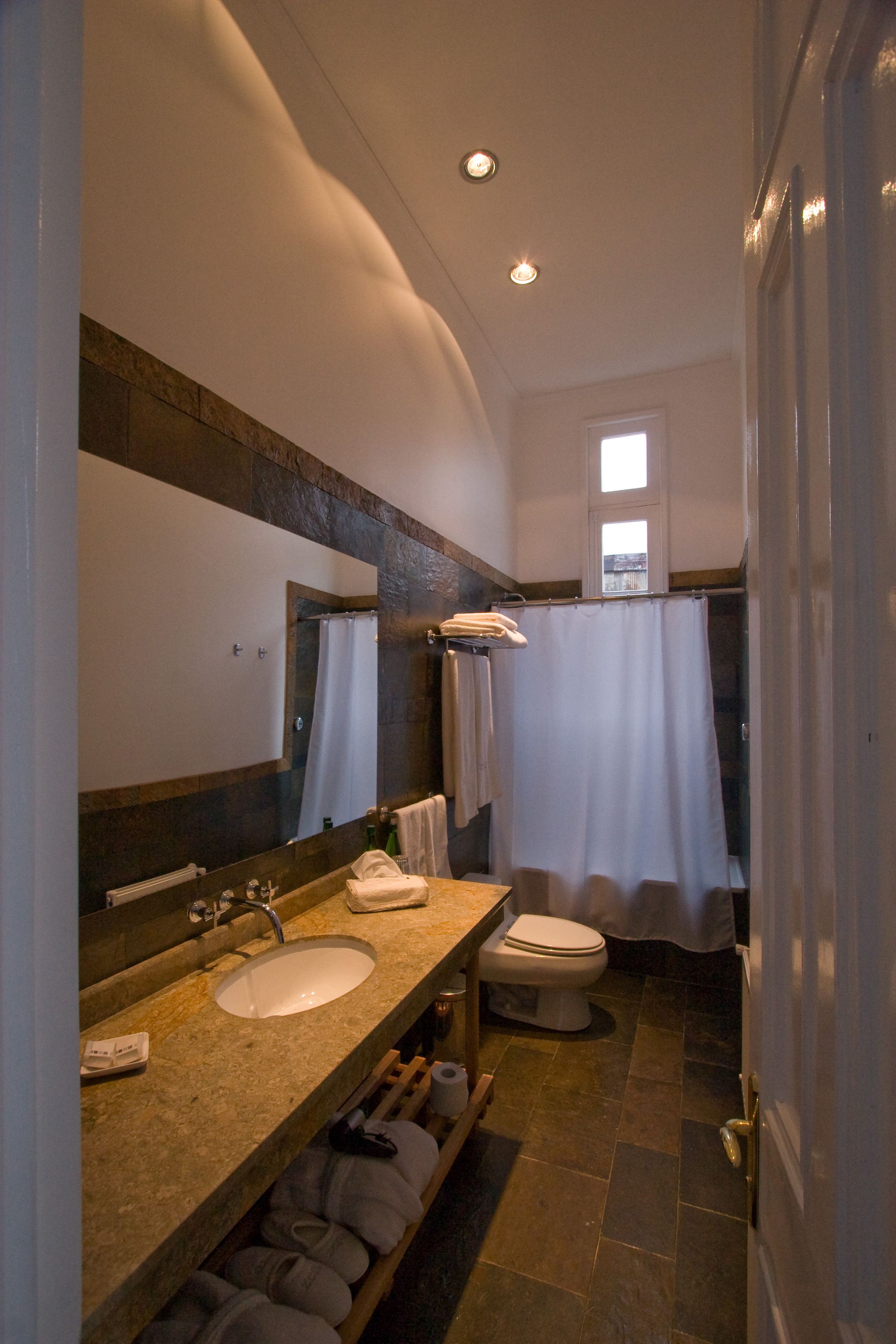 combined shower/bathtub, deep-soaking bathtub, designer toiletries