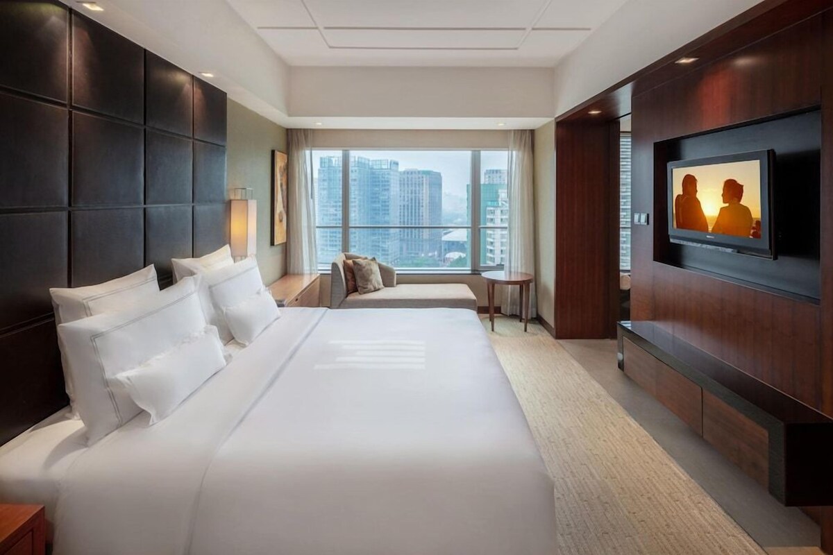Ropa de cama de alta calidad, cubrecamas y minibar 
