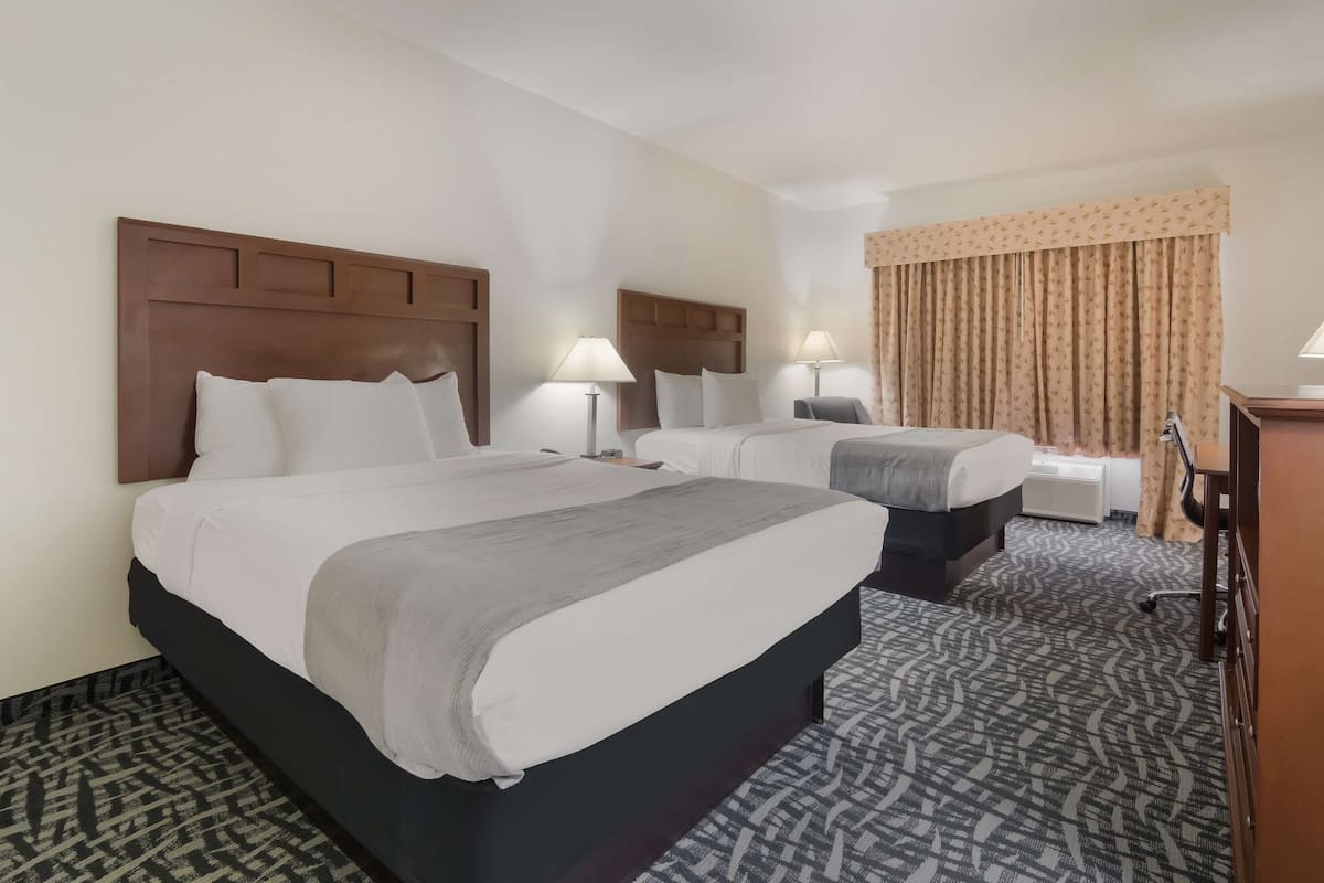 standard room, 2 queen beds, non smoking, refrigerator & microwave | desk, laptop workspace, iron/ironing board, free wifi