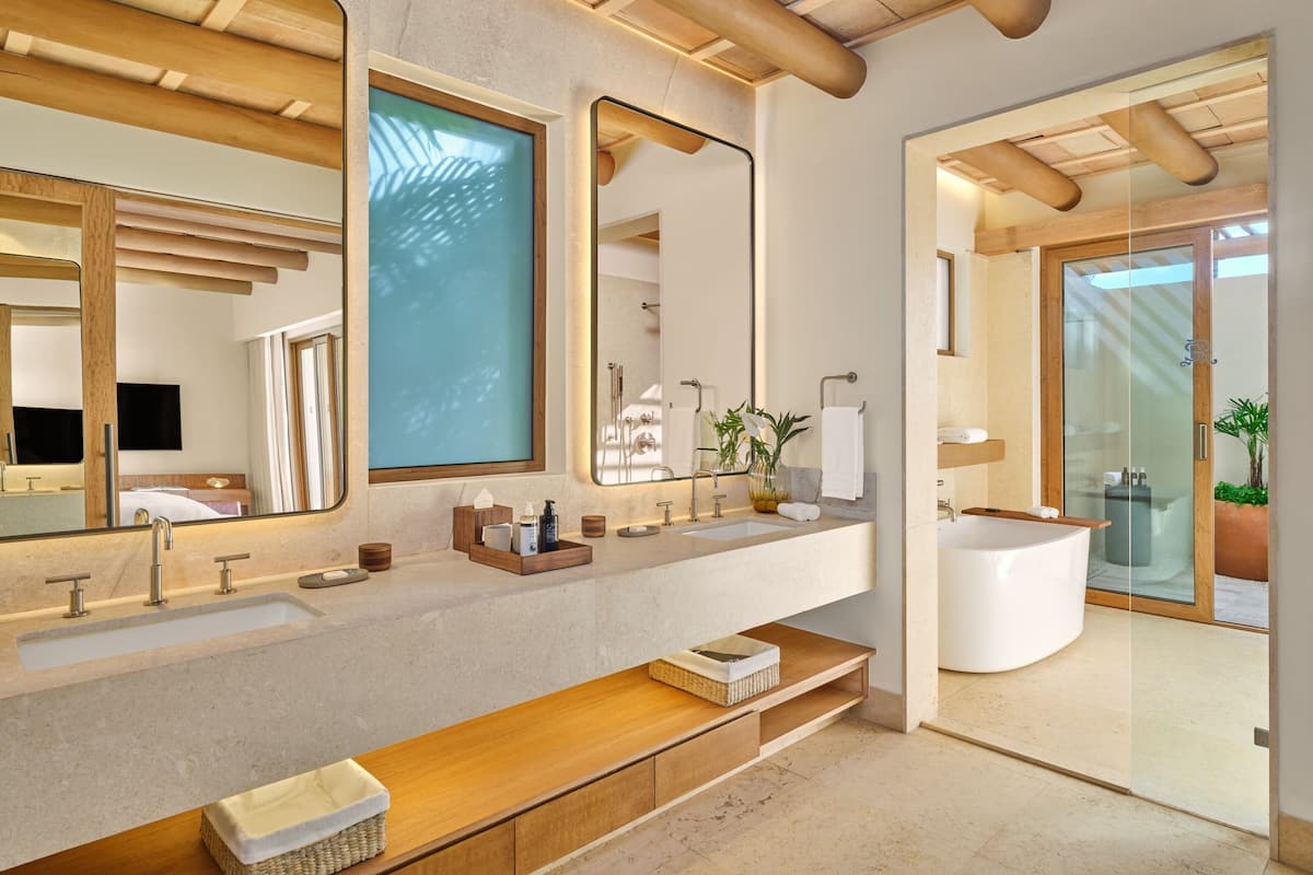 presidential villa, 1 double bed, non smoking, beachfront | bathroom | separate bathtub and shower, free toiletries, hair dryer, bathrobes