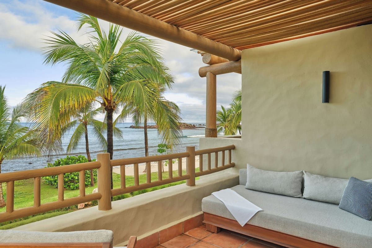 Habitación, 1 cama de matrimonio grande, frente a la playa | Playa | Playa privada, submarinismo, kayak y pesca