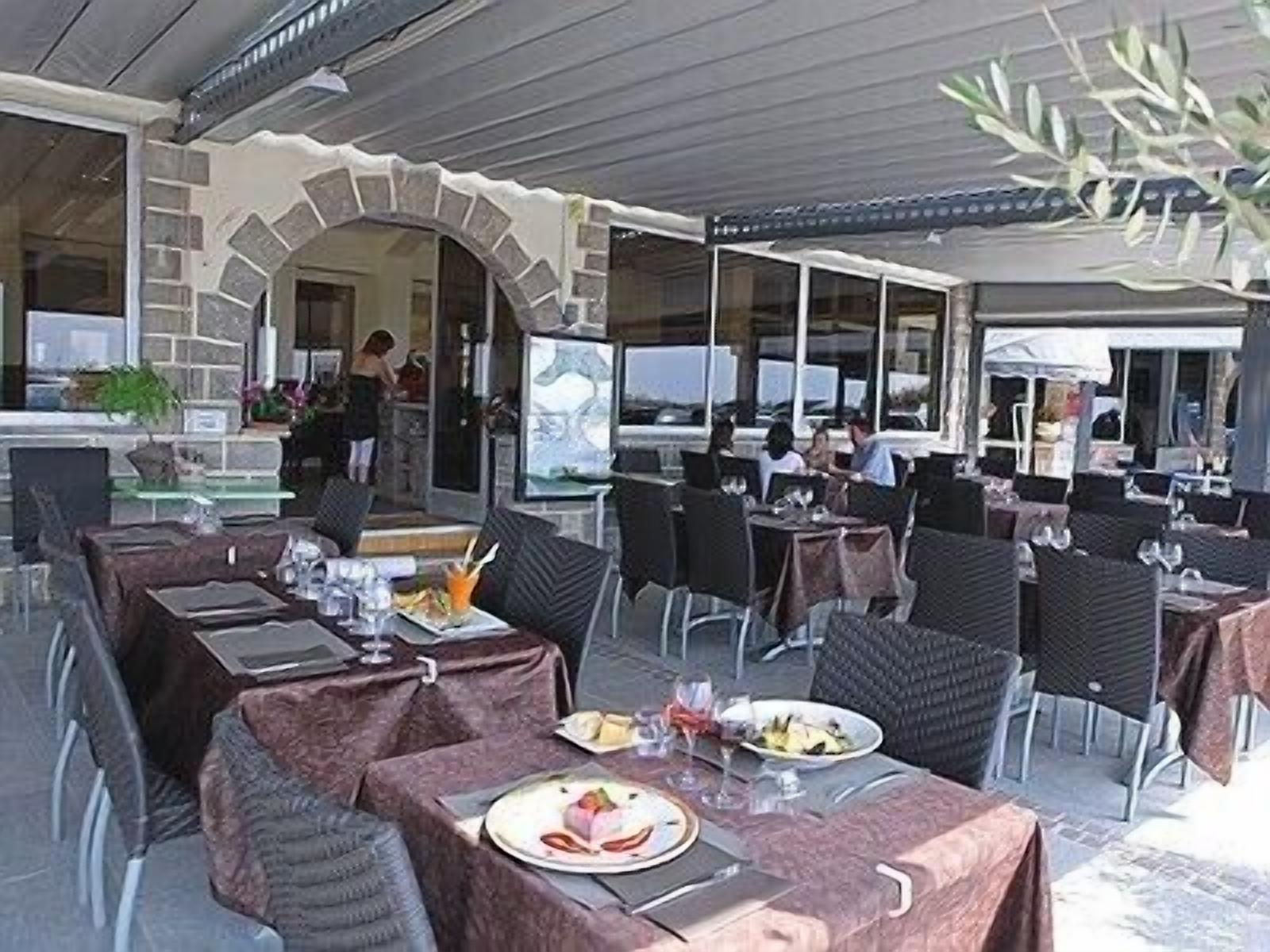 breakfast, lunch, dinner served; french cuisine, beach views