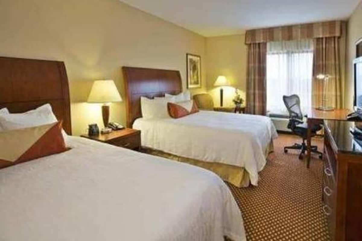 Premium bedding, down comforters, pillowtop beds, in-room safe