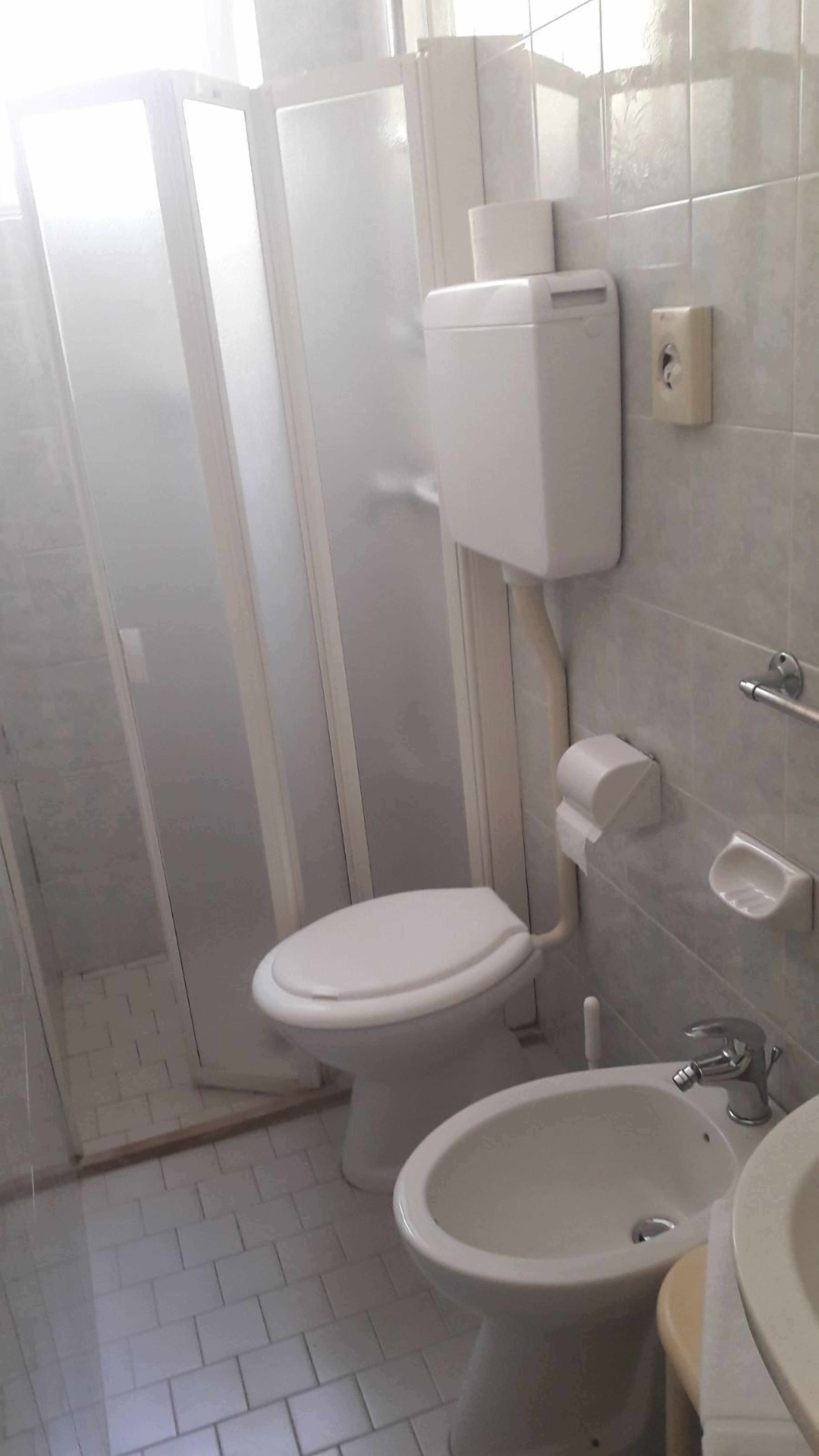 double room | bathroom | shower, hair dryer, bidet, towels