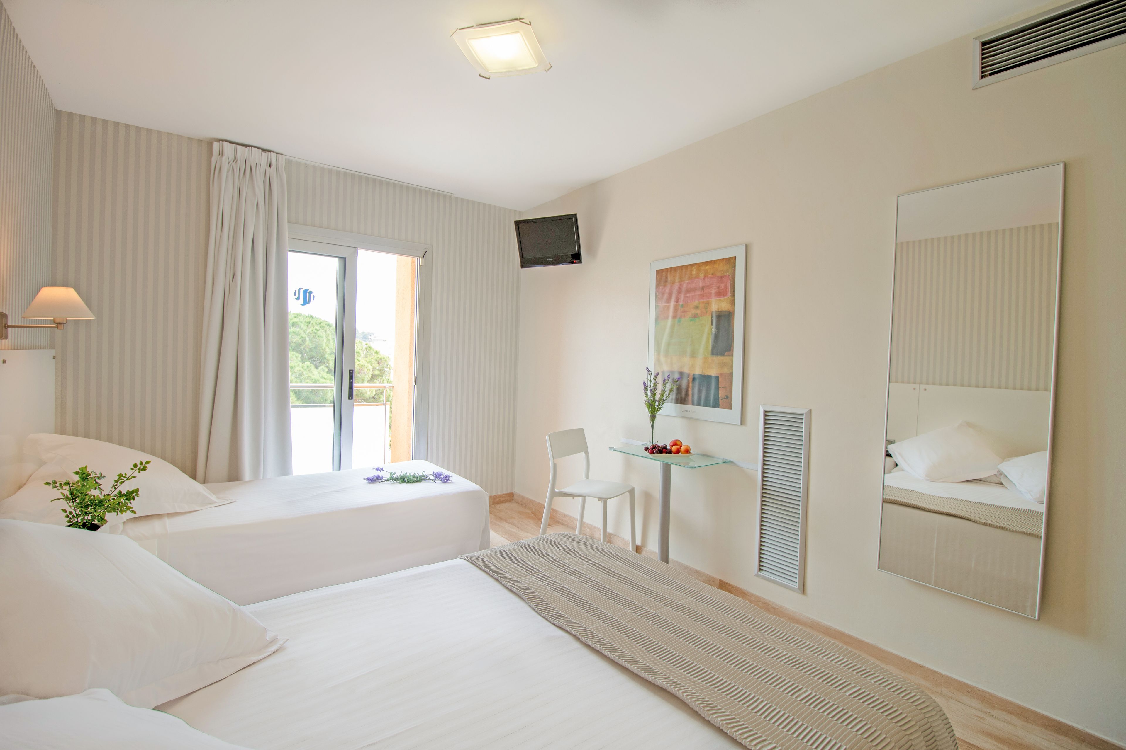 triple room | premium bedding, minibar, in-room safe, blackout curtains