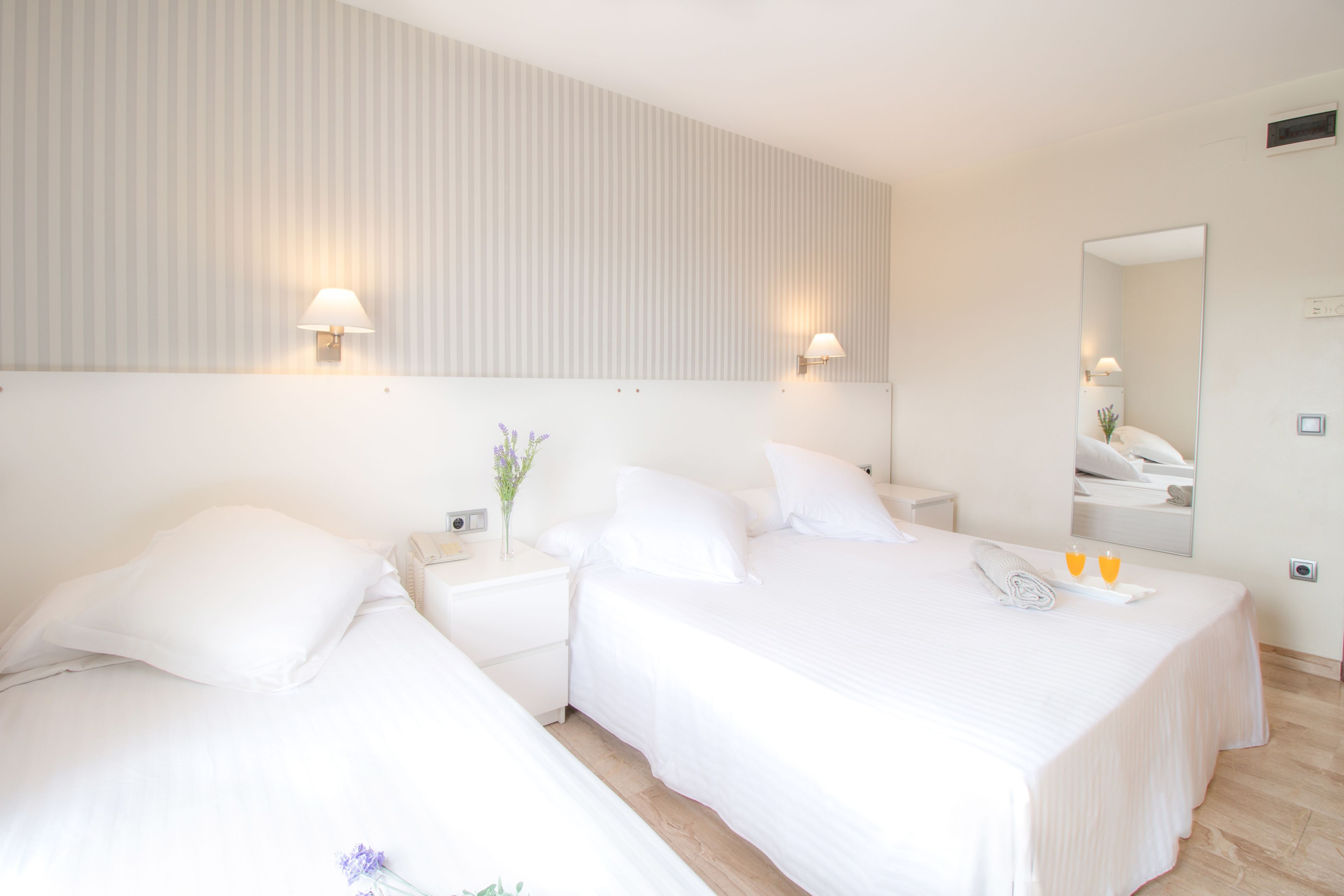 triple room | premium bedding, minibar, in-room safe, blackout curtains