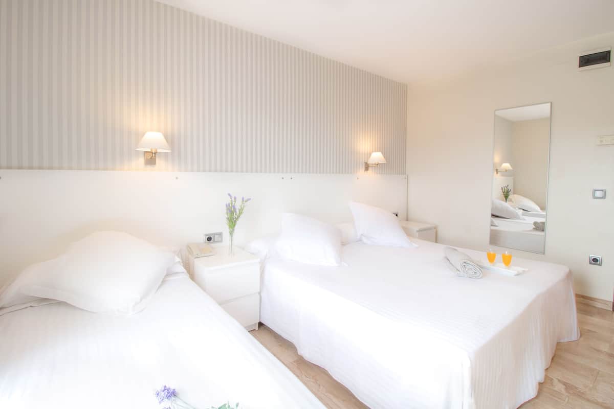 triple room | premium bedding, minibar, in-room safe, blackout curtains