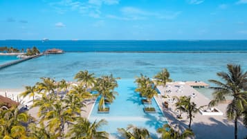 Outdoor pool, pool umbrellas, sun loungers