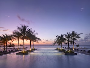 Outdoor pool, pool umbrellas, sun loungers