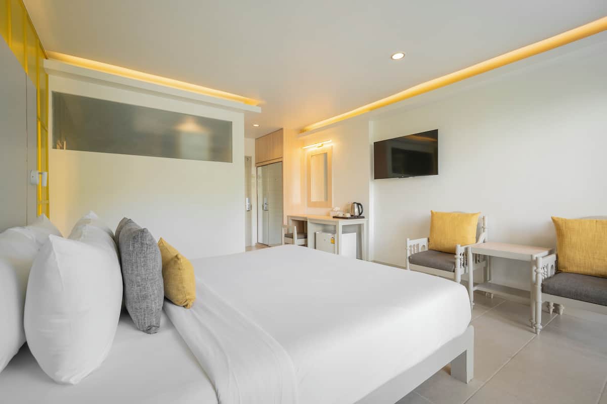 Superior Room - Pool View | Minibar, in-room safe, free WiFi, bed sheets