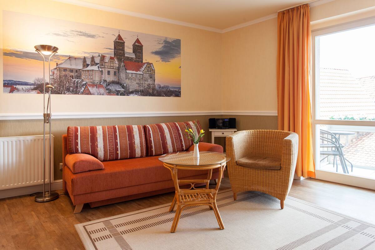 suite | living area | 80-cm tv with satellite channels, dvd player
