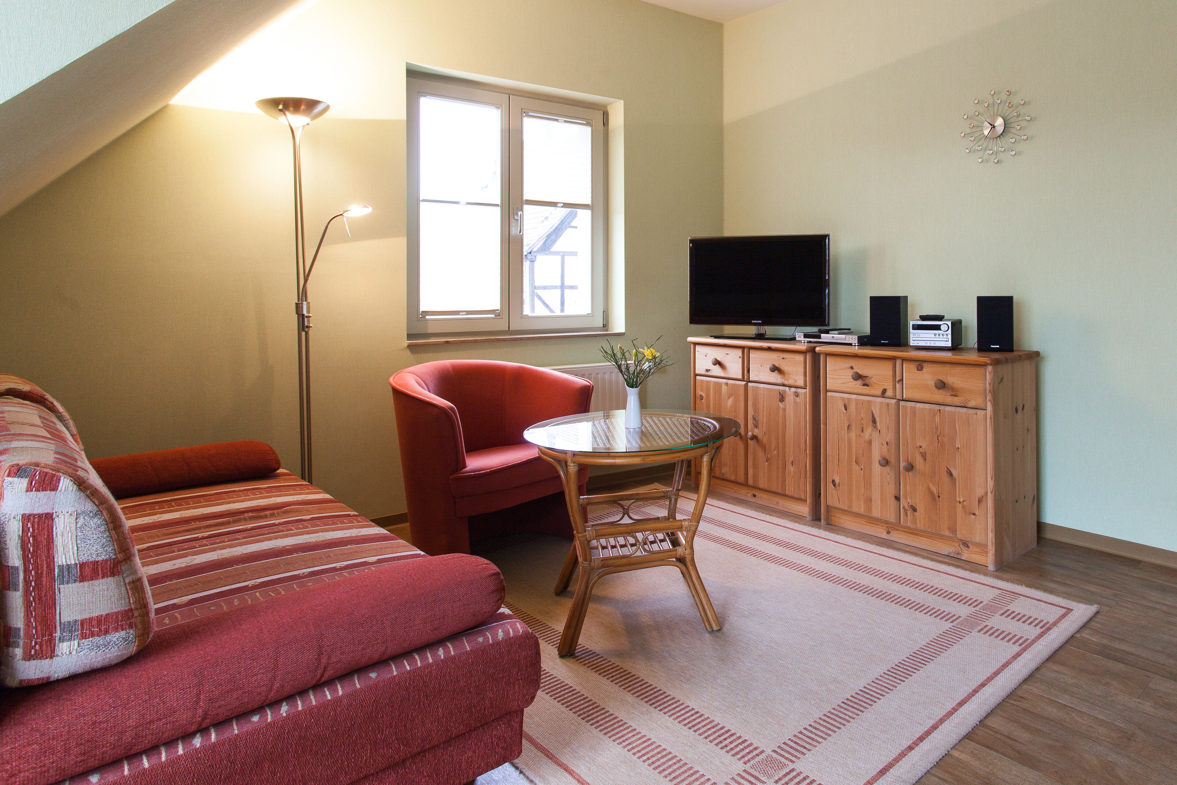 suite | living area | 80-cm tv with satellite channels, dvd player