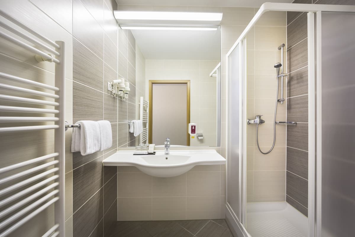 shower, free toiletries, hair dryer, bathrobes