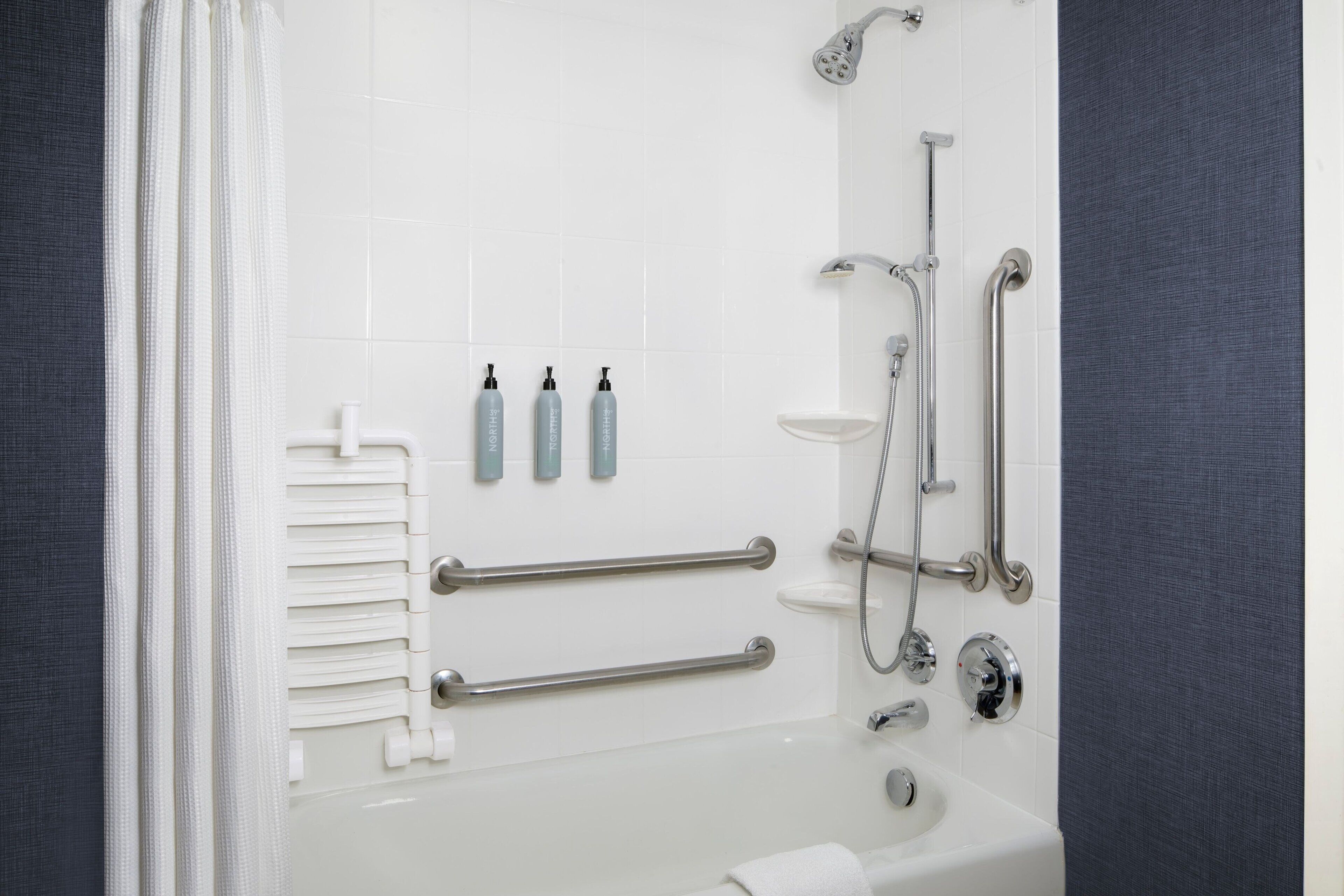 combined shower/bathtub, free toiletries, hair dryer, towels