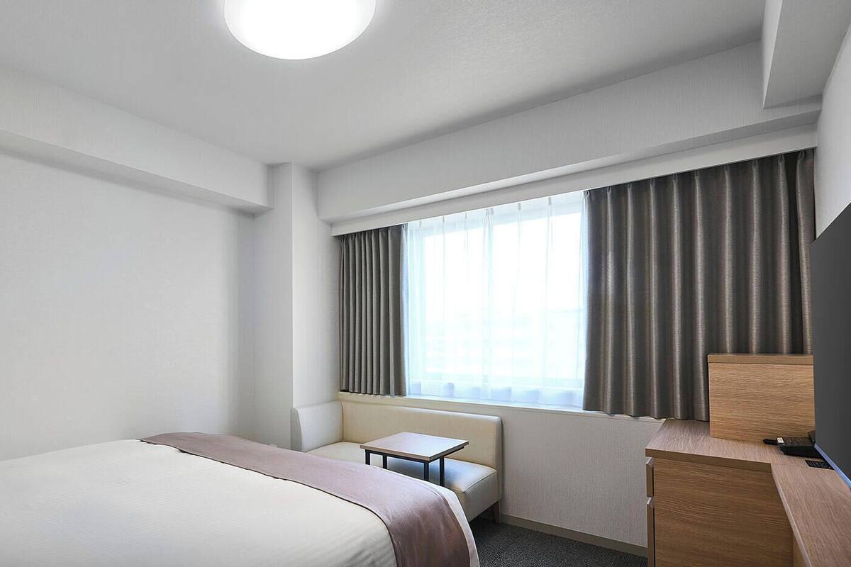 Quarto casal superior, para não fumantes | Edredons de pluma, cortinas blackout, ferros/tábuas de passar roupa
