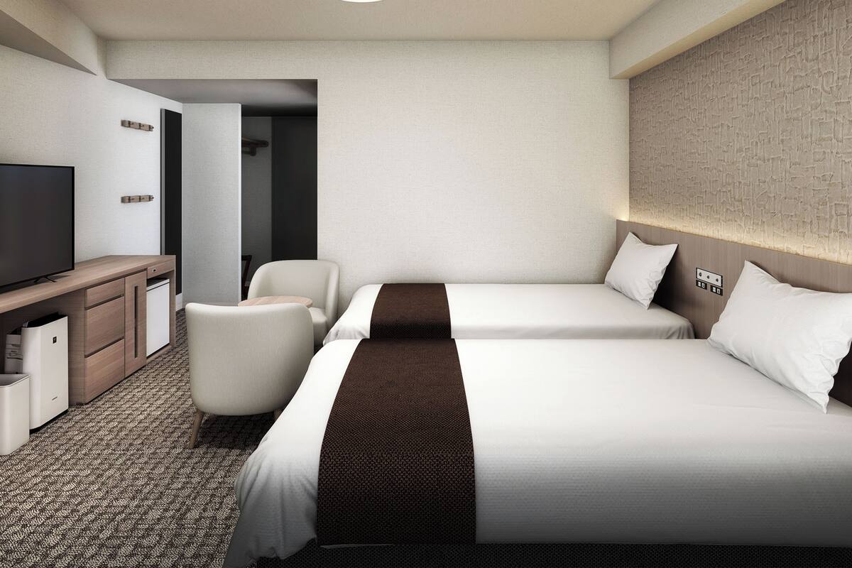 Chambre avec lits jumeaux (Universal Design) | Couette en duvet, rideaux d’obscurcissement, fer et planche à repasser