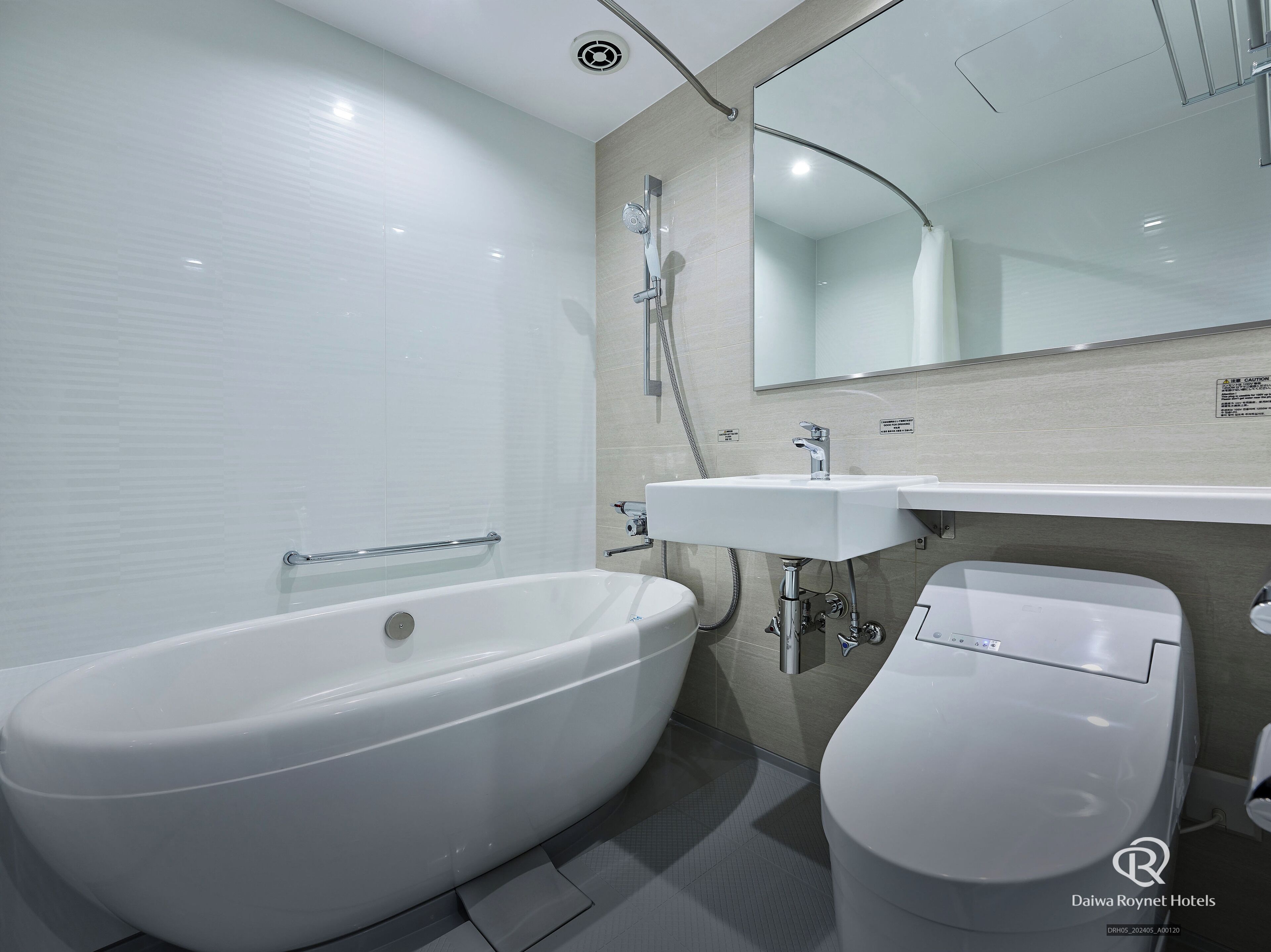 combined shower/bathtub, free toiletries, hair dryer, slippers