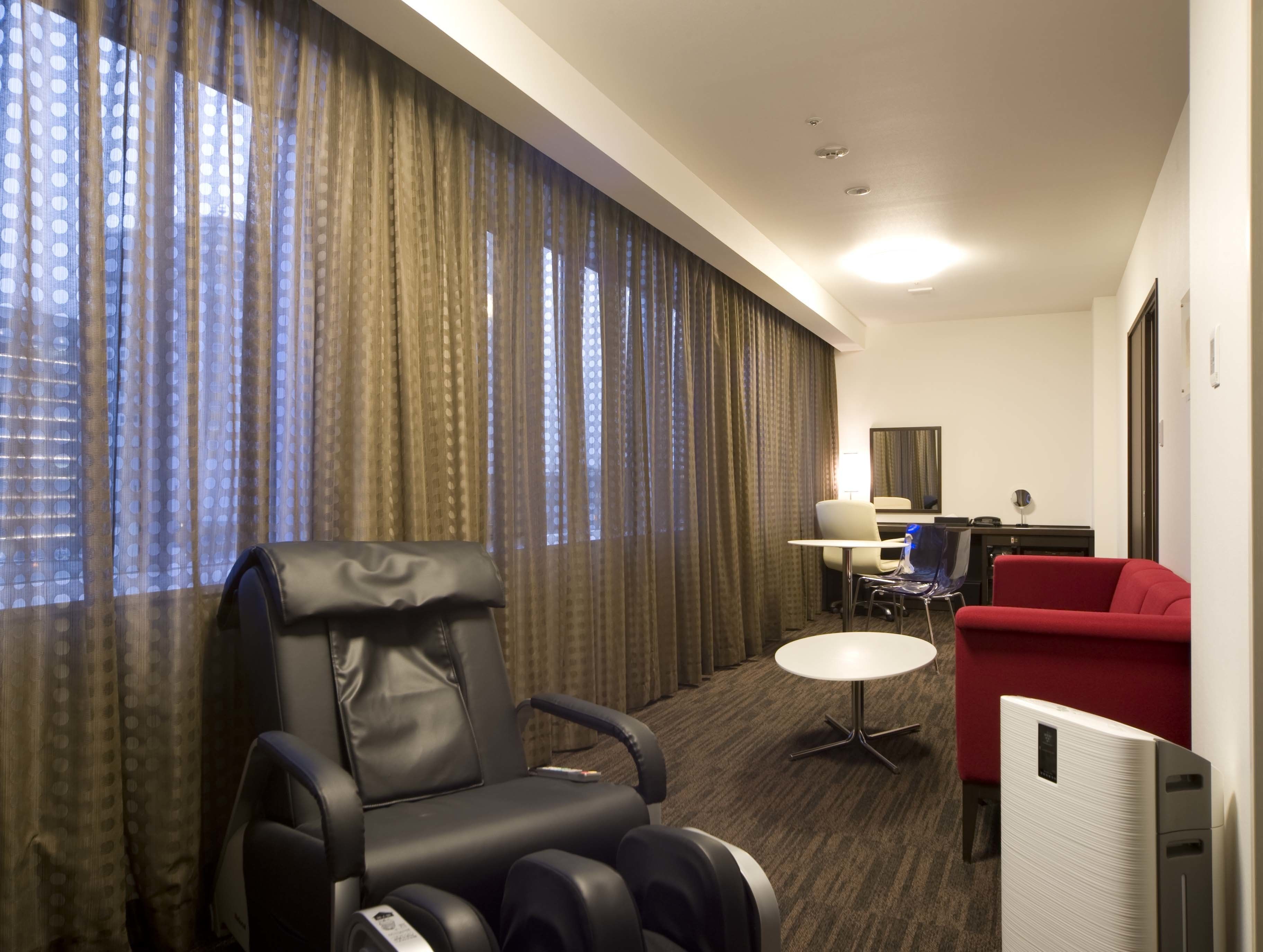 junior suite room [no choice of smoking preference] | 1 bedroom, desk, blackout curtains, iron/ironing board