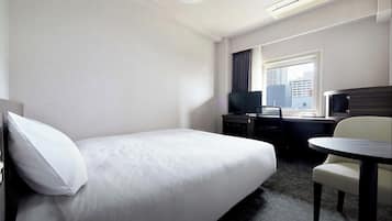 Down duvets, desk, laptop workspace, blackout curtains