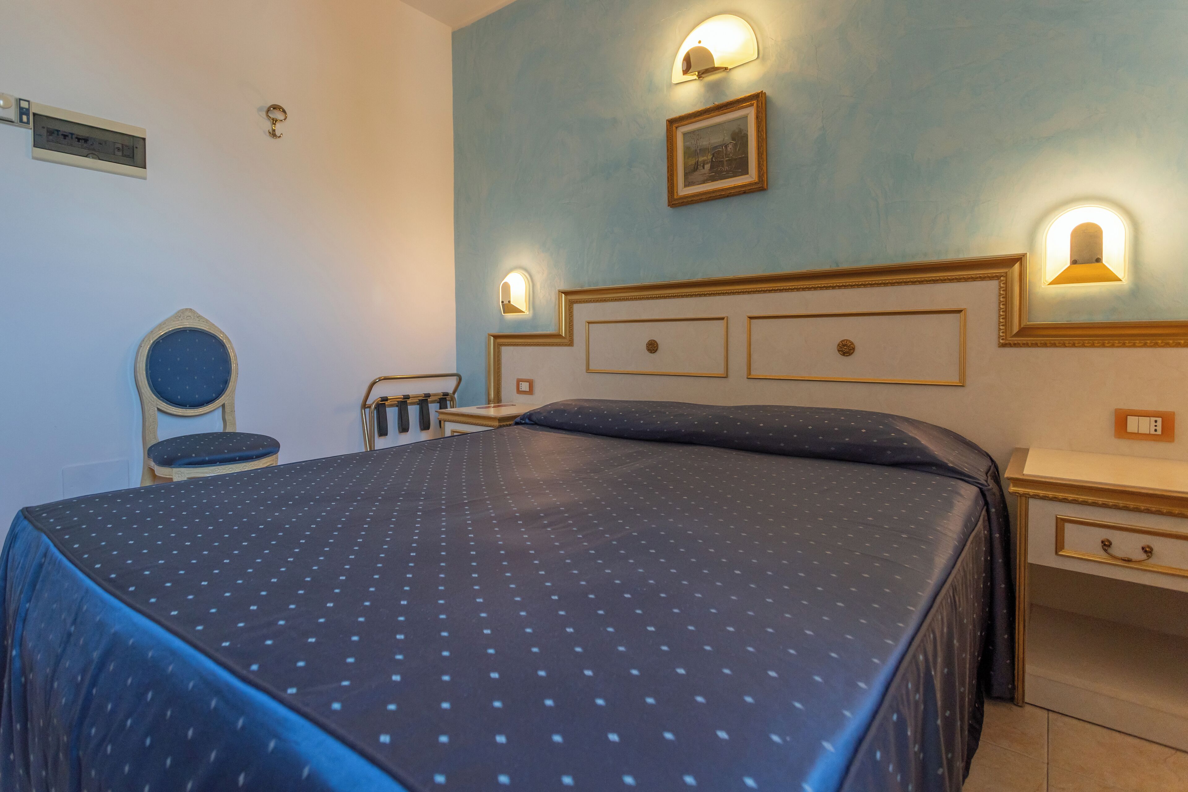 Economy Double or Twin Room | Minibar, in-room safe, desk, laptop workspace