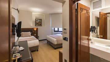 Triple Room | Minibar, in-room safe, desk, soundproofing