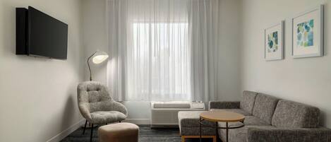 Suite, 2 Bedrooms | Living room | 32-inch flat-screen TV with satellite channels, Netflix