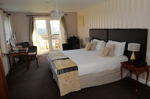 Individually decorated, desk, iron/ironing board, rollaway beds