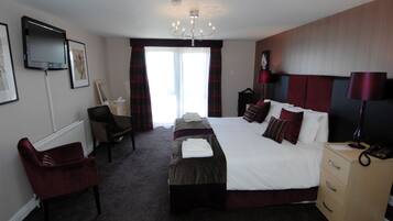 Individually decorated, desk, iron/ironing board, rollaway beds