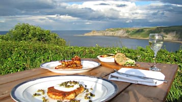 Breakfast, lunch, dinner served; British cuisine, sea views 