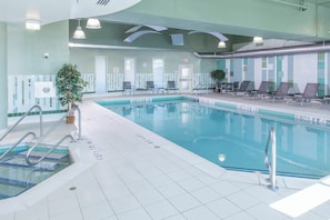 Indoor pool, open 6:00 AM to 11:00 PM, pool loungers