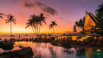2 outdoor pools, open 7:00 AM to 7:30 PM, pool umbrellas, pool loungers