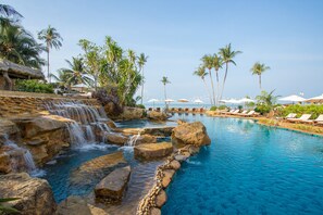 2 outdoor pools, open 7:00 AM to 7:30 PM, pool umbrellas, sun loungers