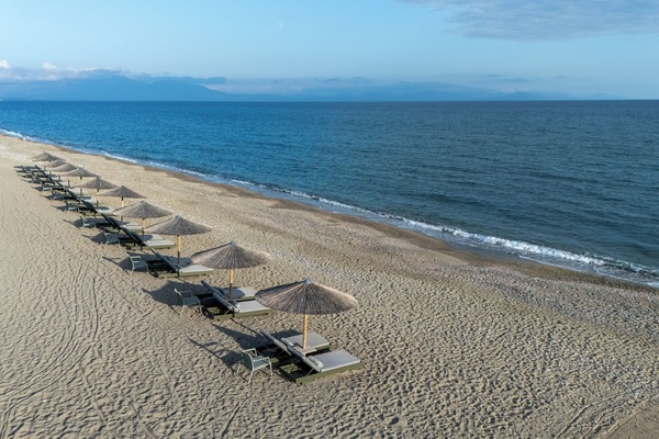Privat strand, solsenger, parasoller og strandhåndklær