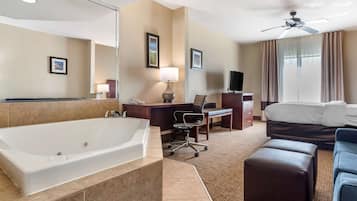 Suite, 1 King Bed, Non Smoking, Hot Tub | Desk, laptop workspace, blackout curtains, iron/ironing board