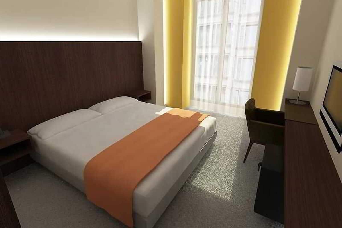 Minibar, caja de seguridad en la habitación y escritorio