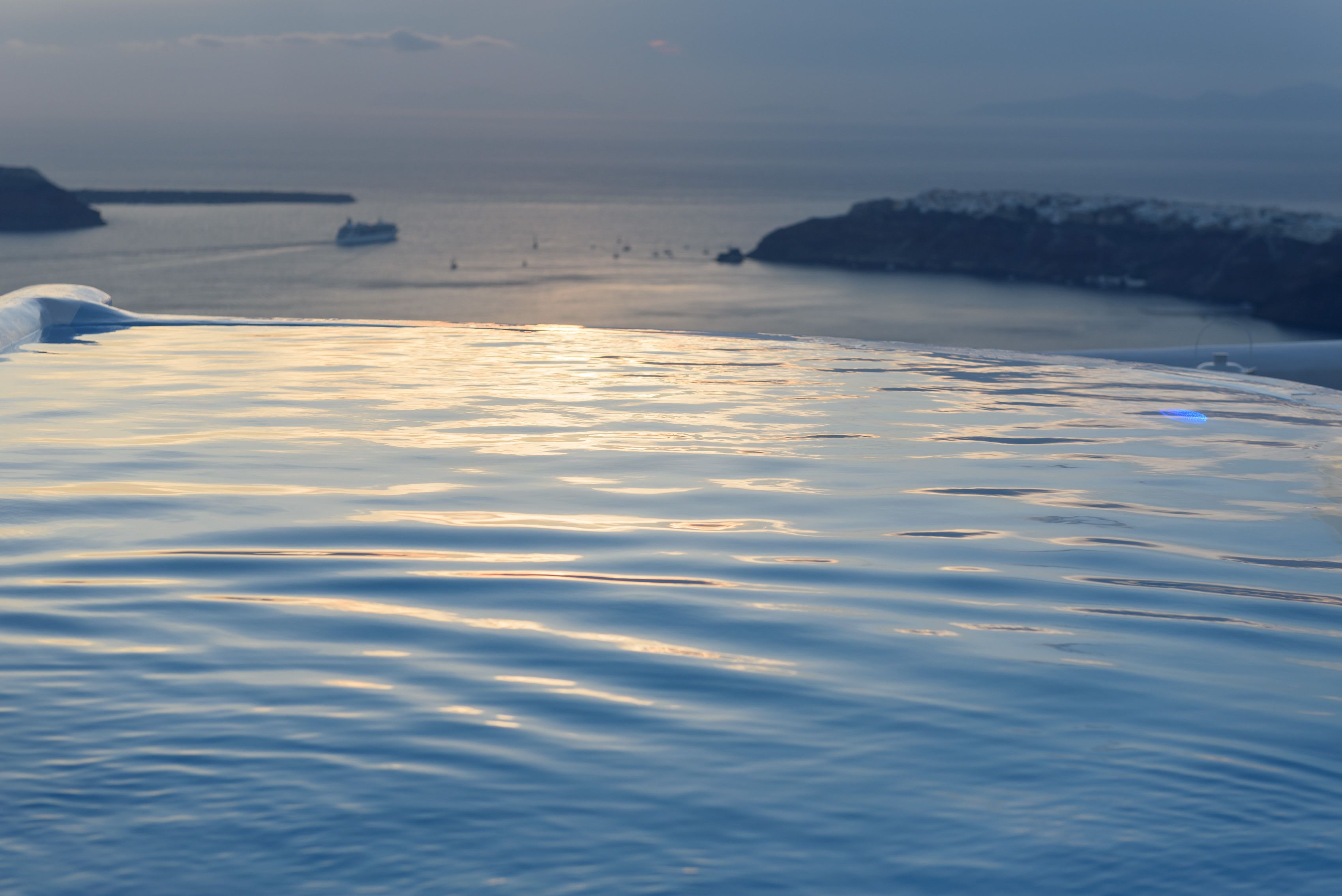 outdoor pool, open 10:30 am to 7:30 pm, pool umbrellas, pool loungers