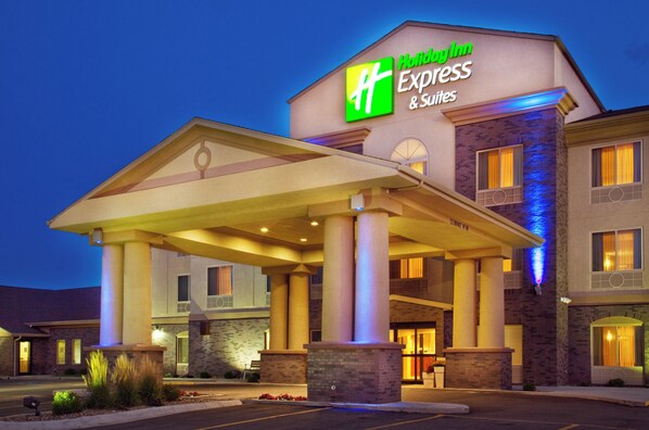 A Holiday Inn Express hotel with a covered entrance and multiple windows.