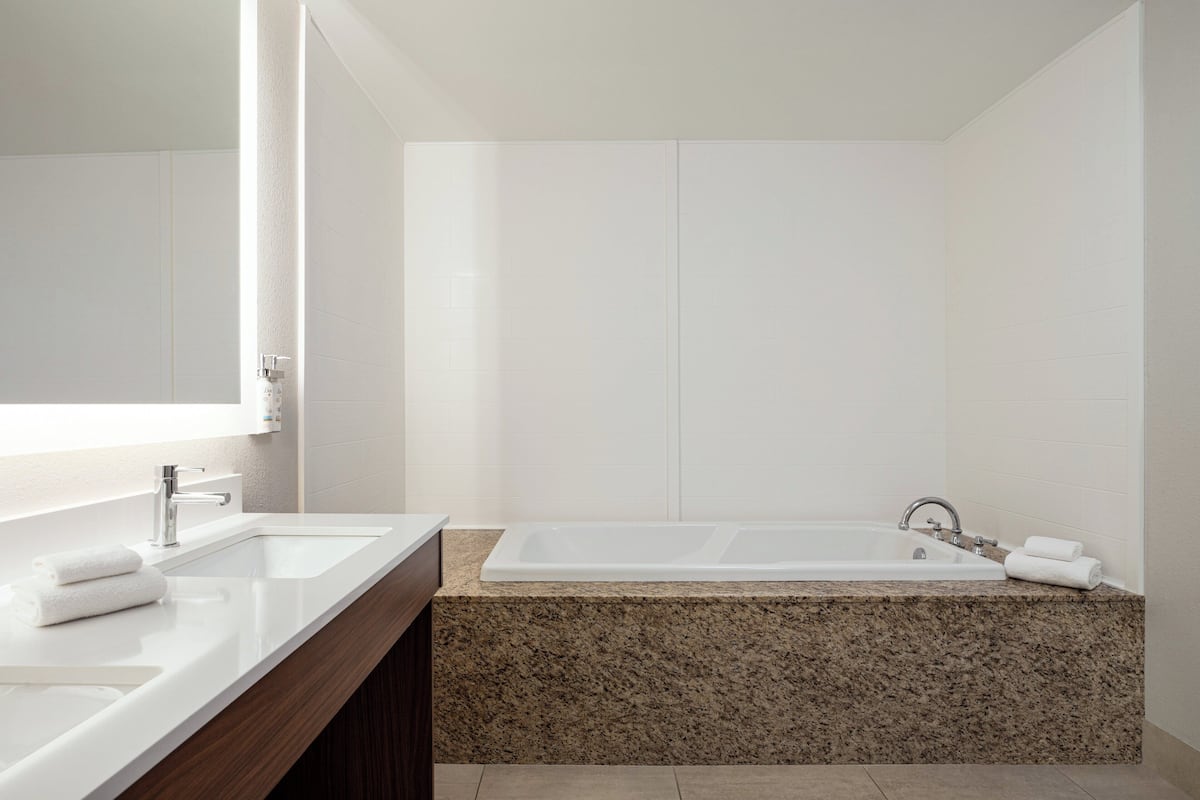 Suite, 1 Bedroom | 1 bedroom, desk, iron/ironing board, free WiFi