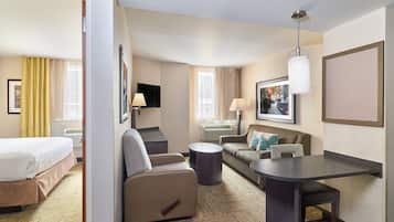 Suite, 1 Bedroom | 1 bedroom, in-room safe, desk, iron/ironing board