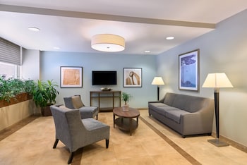 Hotel entrance and lobby at Candlewood Suites New York City-Times Square by IHG