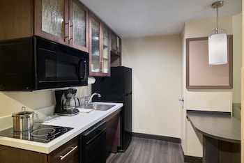 Suite, 1 Bedroom, Accessible (Roll-In Shower) | 1 bedroom, in-room safe, desk, iron/ironing board at Candlewood Suites New York City-Times Square by IHG