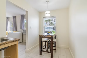 Apartment, 1 King Bed, Accessible | Living area | Flat-screen TV - Soleado Hotel (Fort Lauderdale)